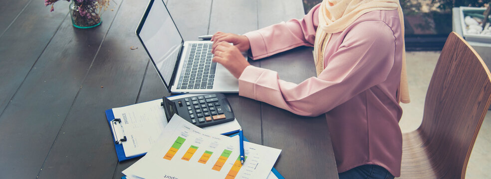Banner Businesswoman hands type on laptop writing on notebook meeting at office desk. Freelance girl work from home via internet call conference sitting at home office morning time. Close up women