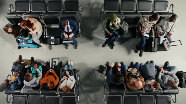 Annoyed, flight delay and top down view of busy airport terminal filled with angry people. Losing plane and holiday trips, high angle shot and frantic travelers upset by flight cancelation