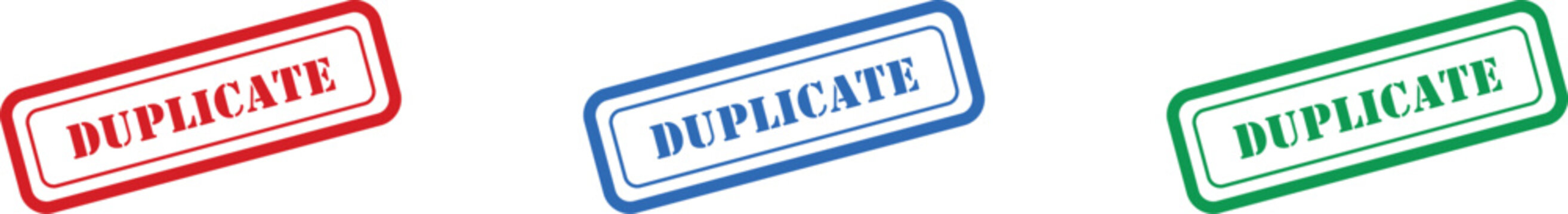 Three distinct rubber stamps showing the word duplicate in bright red, blue, and green hues