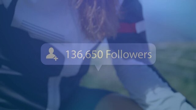 Cyclist tapping bar device, causing followers increasing while camera pulling back for social media