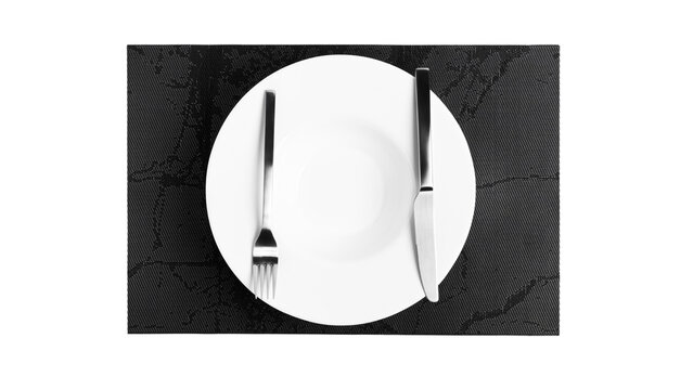Sign language with cutlery. A plate with cutlery isolated on a white background. Plate, knife, fork on a white background.