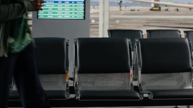 Drinking coffee, waiting for plane and African american woman in busy airport. Waiting, airplane boarding call and girl holding backpack and beverage cup in departure terminal