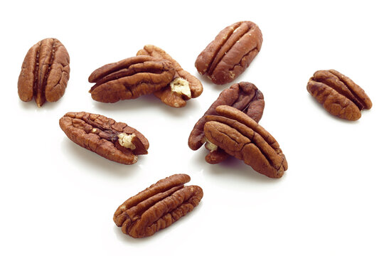 Shelled Pecans isolated on white background