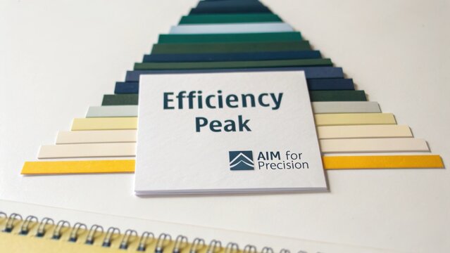 Efficiency Peak Concept With AIM for Precision Logo Displayed Over Layered Color Swatches