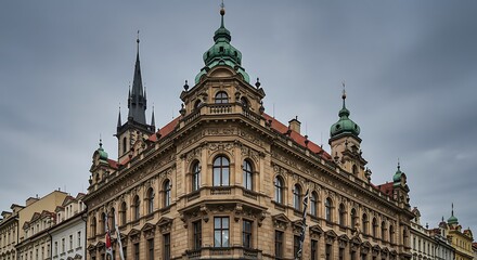 Fototapeta premium Ornate Historical Building in Prague Old Town with Gothic Church Spire in Background