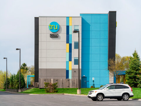 Camillus, NY - Apr 18, 2026: 5:4 view of Tru by Hilton hotel in Township 5 Plaza. Tru by Hilton, launched in 2016 under Hilton Worldwide, operates more than 250 locations worldwide