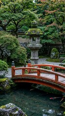 Obraz premium Japanese garden with red bridge and koi pond