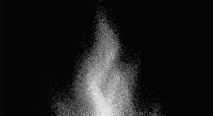 Fototapeta premium White particle spray rising upward against a solid black background. Detailed fine grain texture of white specks creating a mist or powder explosion effect with high contrast.