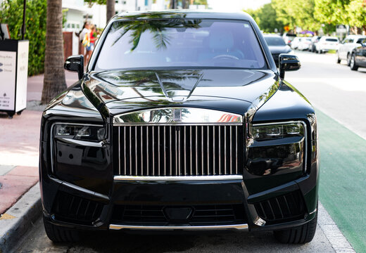 Miami, Florida, USA - July 27, 2025: Car Rolls Royce Cullinan parked outdoor. Black SUV car, corner view. Rolls Royce Cullinan 2025 SUV car. Luxury SUV car Rolls Royce Cullinan