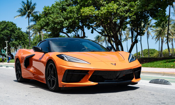 Miami, Florida, USA - August 19, 2025: orange Chevy z06 corner view. Chevrolet Corvette z06 2020 convertible sports car. Luxury sport car Chevrolet Corvette. Car Chevrolet Corvette parked outdoor.