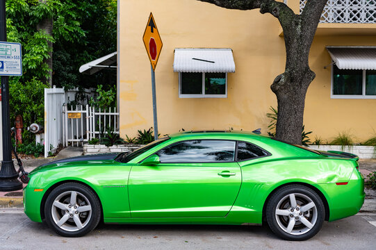 Miami, Florida, USA - July 27, 2025: Chevrolet Camaro coupe 2010 car. Luxury coupe car Chevrolet Camaro. Car Chevrolet Camaro parked outdoor. Green Chevy sportscar, side view.