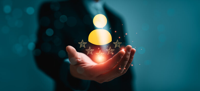 Business professional holding digital customer satisfaction icon with rating stars representing client experience feedback review system service quality evaluation and loyalty management concept
