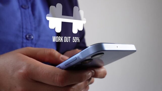 Businesswoman with smartphone in hand. An animated filler image with a weight percentage counter and the word "Workout." Fitness and exercise concept.