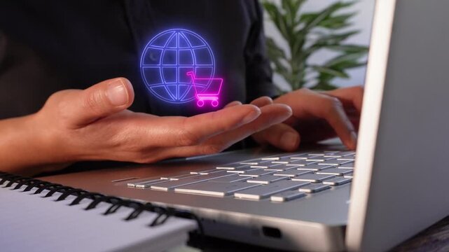 Digital shopping worldwide. Close-up of a businesswoman's hands working on her laptop while holding a virtual globe and shopping cart icon.