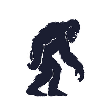 Black silhouette of a bigfoot or sasquatch cryptid creature walking in profile view against a solid white background, featuring a hairy body, long arms, and a stooped gait.