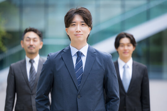 Portraits of a professional business team of trusted mid-level corporate employees, conveying an image of corporate growth and organizational strength. Business scenes featuring three or more professi