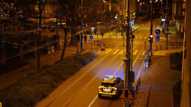 Police car patrolling the streets of Poznan, Poland