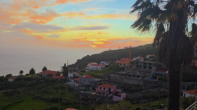 Beautiful Sunset In Calheta, Madeira With Golden Light Over The Atlantic Ocean, Calm Sea, Warm Evening Colors, And Peaceful Coastal Atmosphere Creating Scenic And Relaxing Island Travel Footage