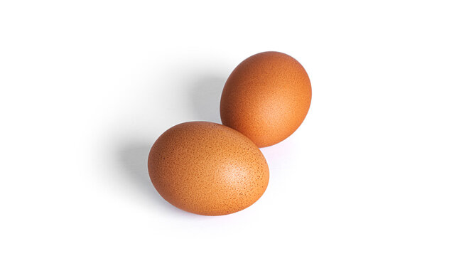 Eggs are isolated on a white background. Brown eggs.