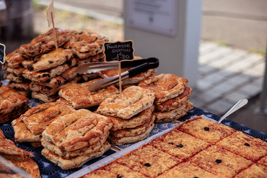 Fougasse and local bakery products at a market in Provence France