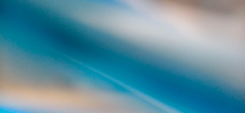Abstract blue background featuring soft gradients and light streaks for modern graphic design projects and digital artistic display usage
