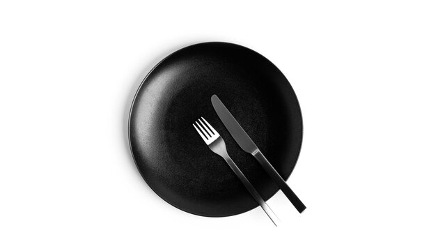 Sign language with cutlery. A plate with cutlery isolated on a white background. Plate, knife, fork on a white background.