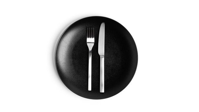 Sign language with cutlery. A plate with cutlery isolated on a white background. Plate, knife, fork on a white background.
