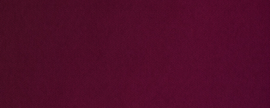 Burgundy chevron zigzag textured background in wine red, maroon, marsala and garnet tones, perfect for modern design, fashion and premium branding.