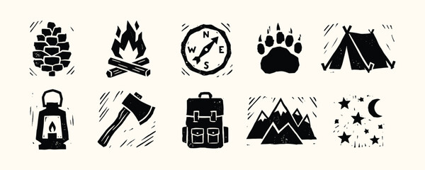 Rustic camping icons in linocut style for outdoor adventure branding and wilderness graphics © Ghaghah24