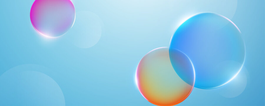 Abstract glossy 3D spheres on light blue gradient background