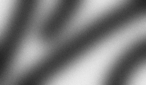 Abstract monochrome gradient background featuring soft diagonal light beams and a heavy grainy texture with a minimalist artistic style