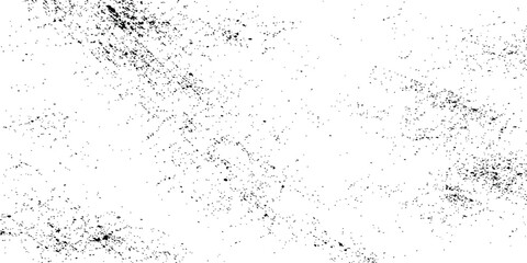 Obraz premium Black speckled scratch texture: abstract distressed background with scattered particles, faded streaks and rough monochrome surface details