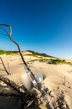 Metal halide lamp globe sand dunes portrait vertical Gia Lai Vietnam