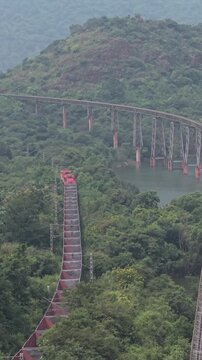 Vertical Aerial View of Railway Bridge with Train in Sandur Karnataka India