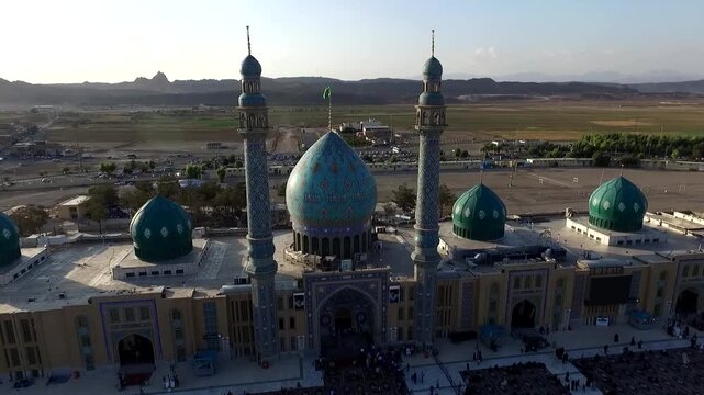 Frontal elevated view of mosque domes and minarets emphasizes Islamic design, sacred identity, and the monumental fa�ade of a celebrated religious architectural site. 