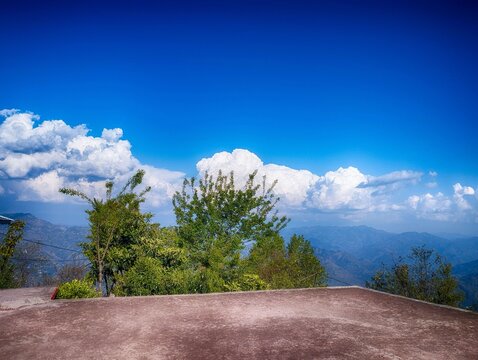 Blue Sky with clouds beautiful Murree Village view.