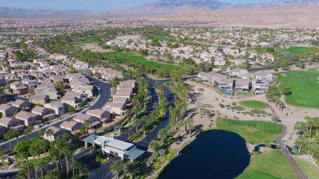 Southwest Las Vegas Descending Aerial View of Palm Lined Golf Course Community