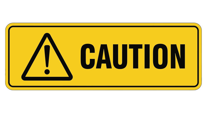 A caution sign with a warning triangle is displayed prominently outdoors on a sign.