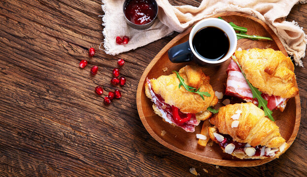 Breakfast served with coffee and croissants. Balanced diet.