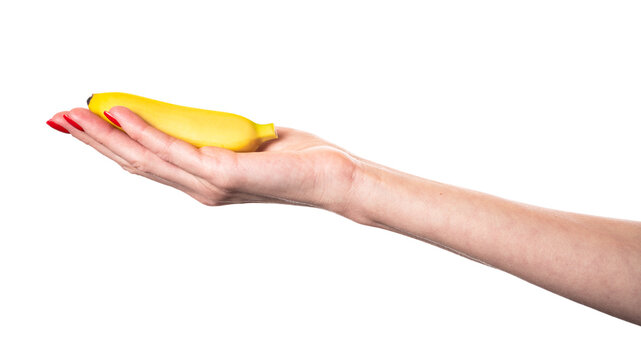 Baby banana or small banana in hands isolated on white background. Small bananas.