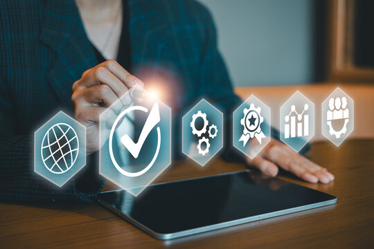 Professional using digital interface with icons representing global network, quality check, settings, and analytics.