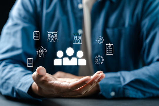 Businessman holding smartphone and open hand. Augmented reality and business opportunity concept.