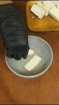 Adding Slices of Fresh Tofu Into Seasoned Liquid Batter