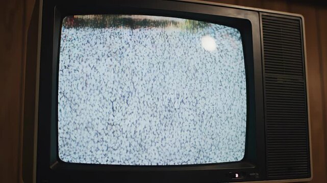 Old television with static screen.