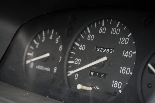 Close-up of a Car Dashboard Showing Speedometer and Odometer Details.