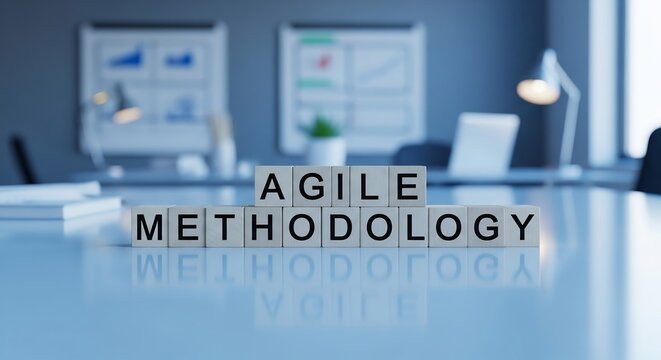 Agile methodology spelled with letter wooden boxes in modern office