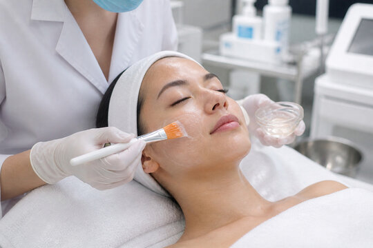 Close-Up Facial Treatment with Advanced Skincare Device, Clean Clinical Environment