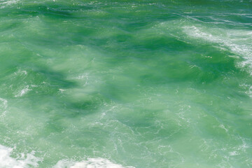 Obraz premium Turquoise ocean waves close up