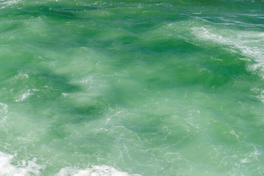Turquoise ocean waves close up