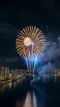 Celestial Symphony: Captivating bursts of fireworks illuminate the night sky above a tranquil body of water, with a cityscape nestled in the background, a dazzling display of light and color.